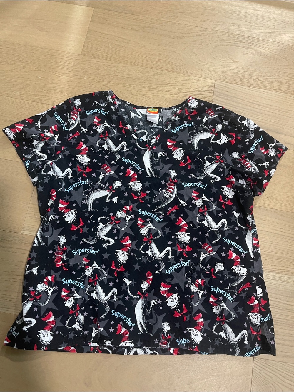 Dr. Seuss Black scrub Top with Red and White Cat in the Hat Print